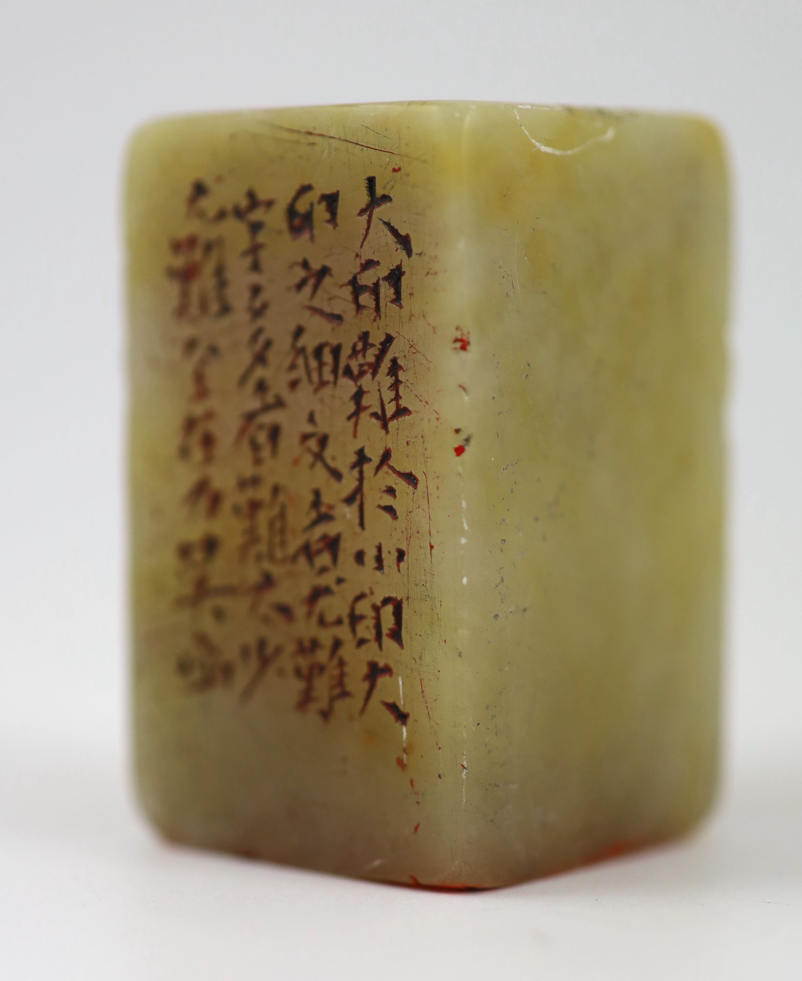 A Chinese cream and russet soapstone square seal, 5.2 cm high
